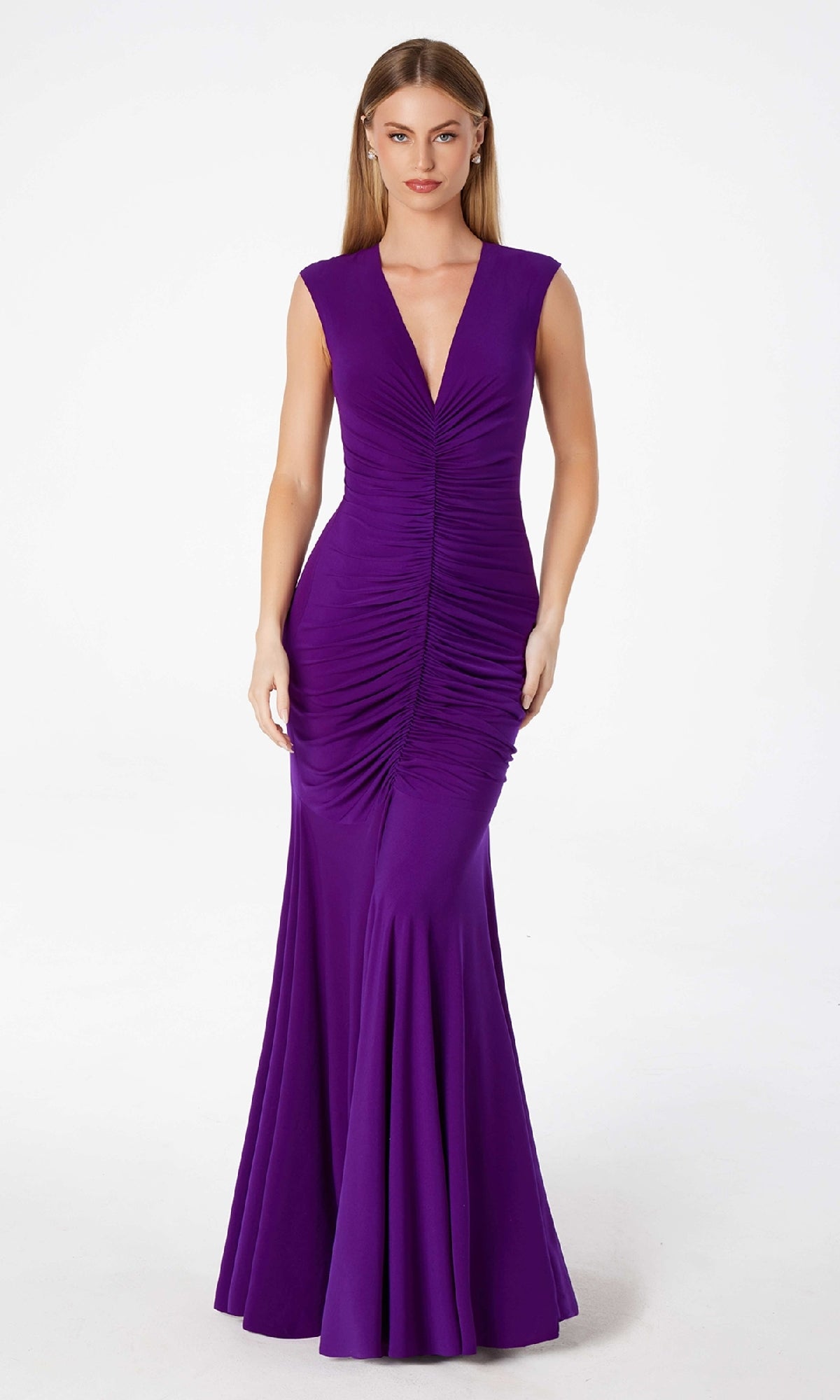 A woman models the Astee T2009 Cap-Sleeve Long Ruched Prom Dress in deep purple, featuring a deep V-neck, against a plain white background.